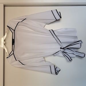 Eloquii white tunic top with navy blue trim